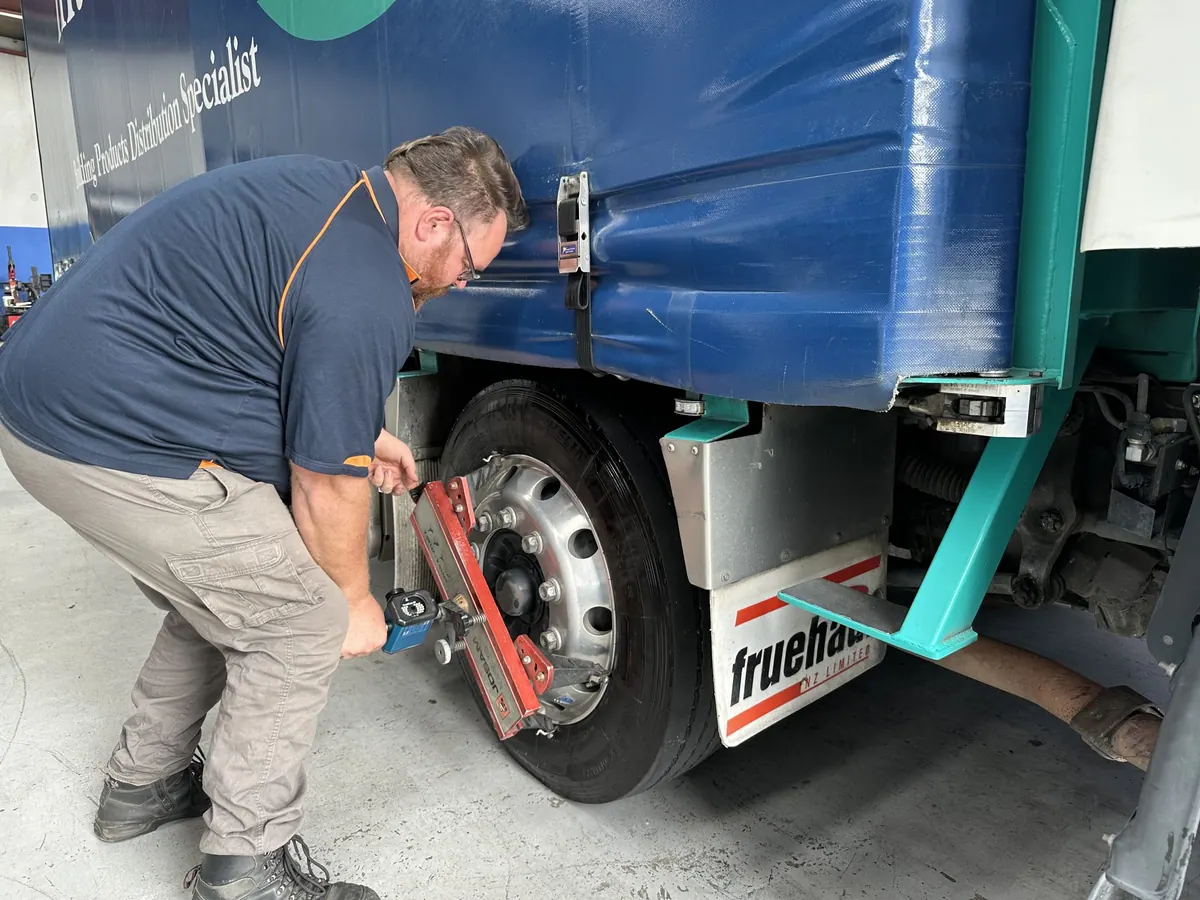 Heavy truck positioned on an AutoTreads alignment ramp in East Tamaki